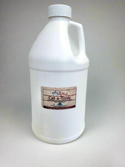 White bottle labeled 'Cat-a-Tonic' on a white surface with a gray background